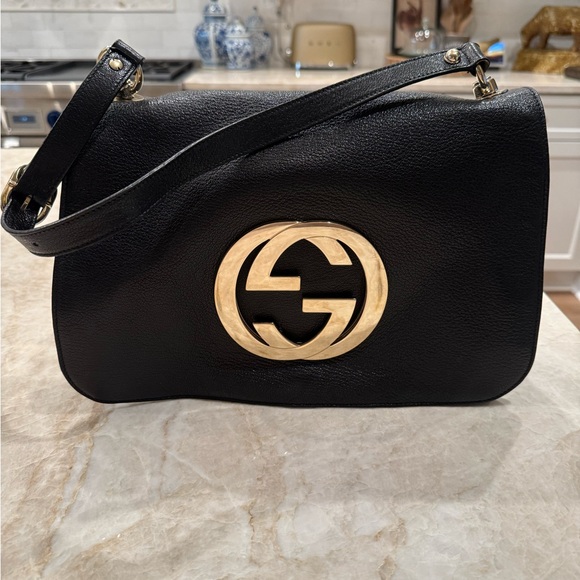 Gucci Handbags - Gucci Black Leather Shoulder Bag with Gold Emblem